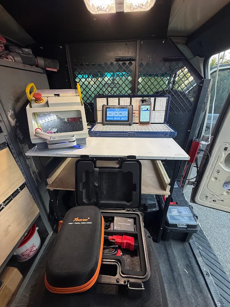 Inside Lockswift mobile van equipped with Xhorse Key Tool Max Pro and key cutting workstation